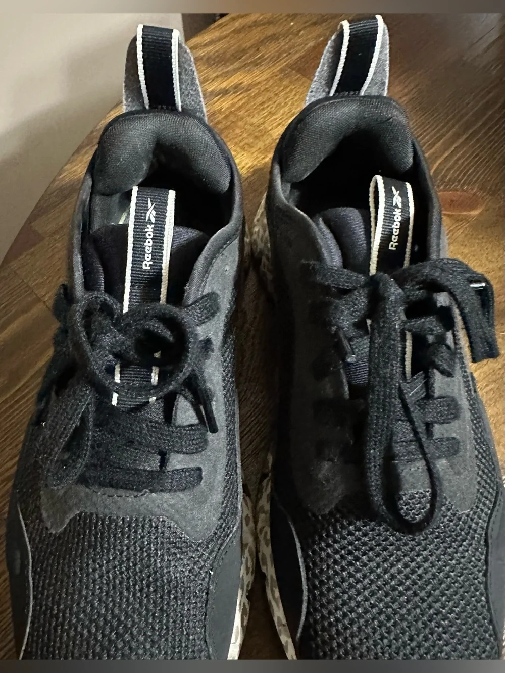 Reebok Black Athletic Sneakers with Leopard-Print Sole